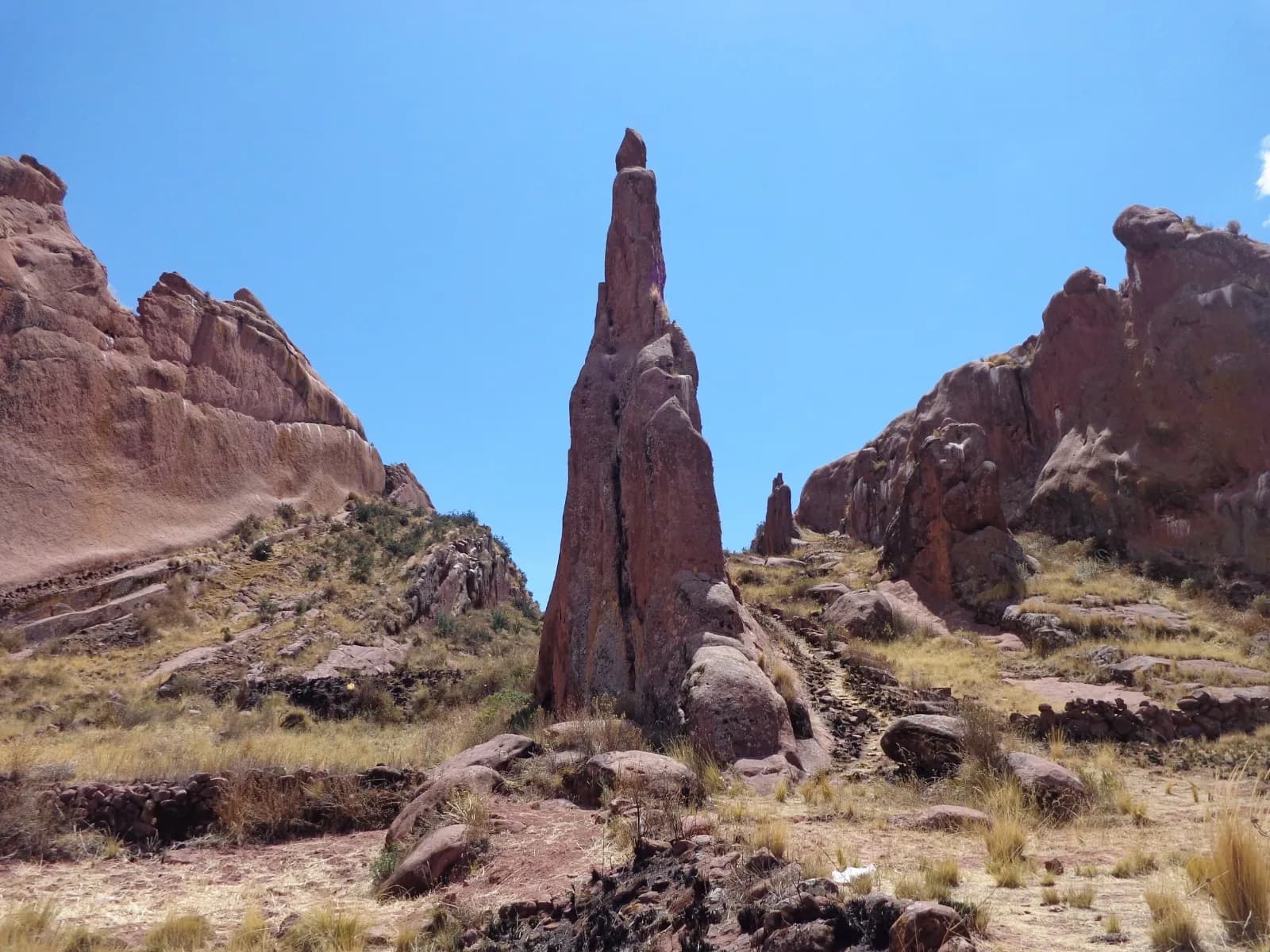 Sacred red sandstone rock formation on the Puno altiplano