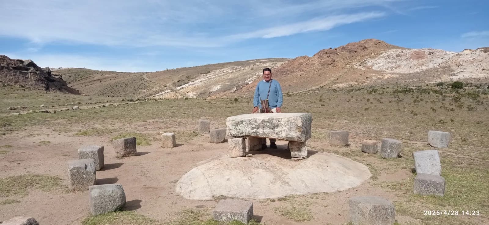 Stone ceremonial table ringed by a circle of lithic seats on the altiplano