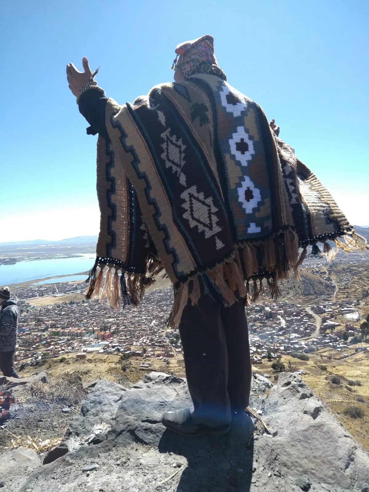 Offering with open arms from a lookout above the city of Puno